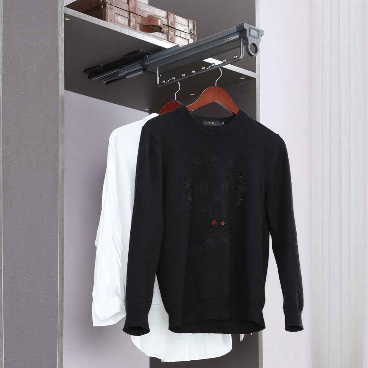 Top mounted clothes holder 